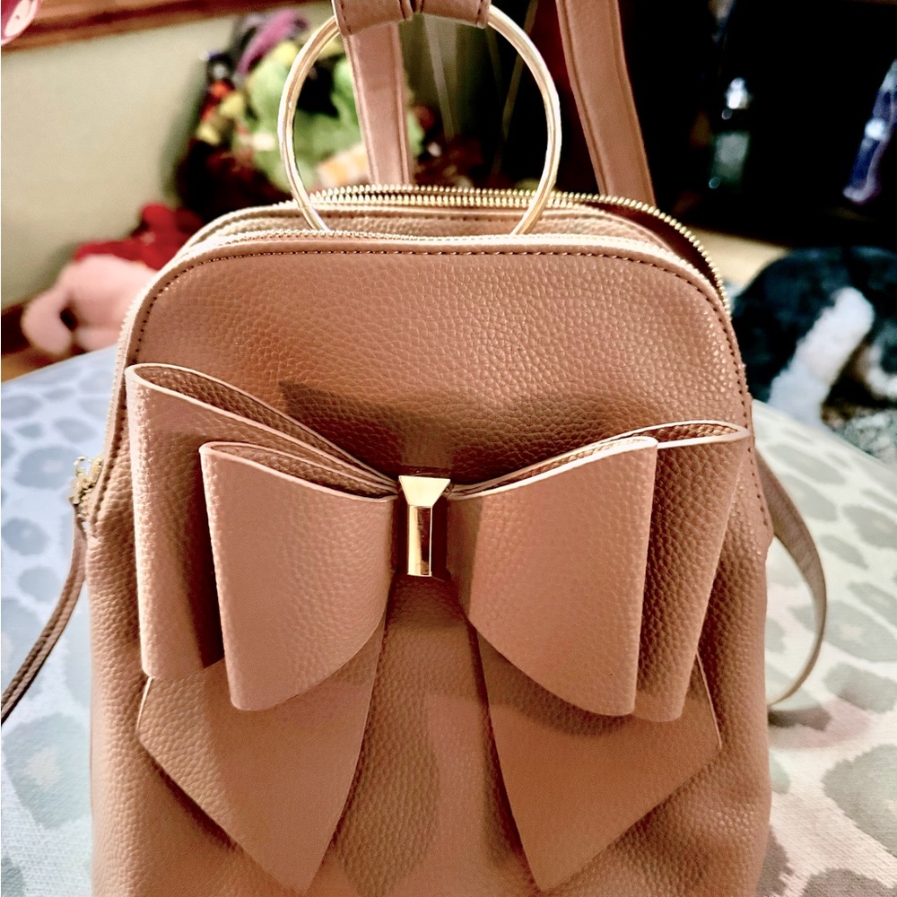 Crossi Blush Pink Bow Back-Pack Handbag- gold accent